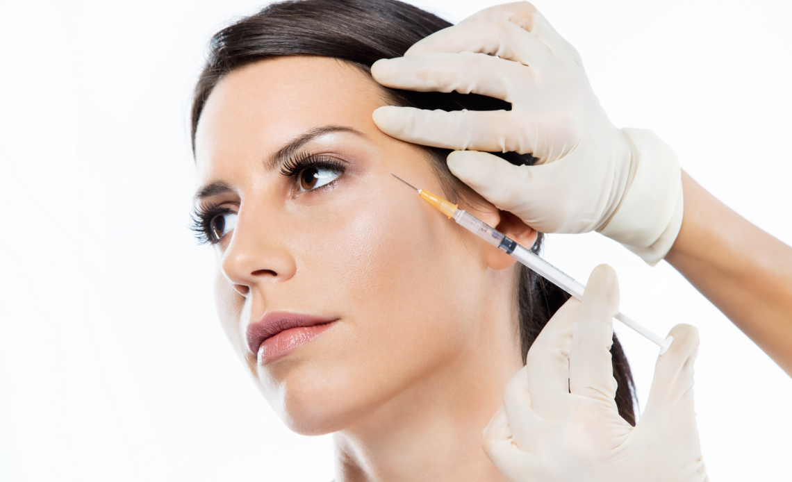 women going through botox treatment for face